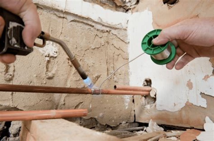 How do you remove green corrosion from copper pipes?