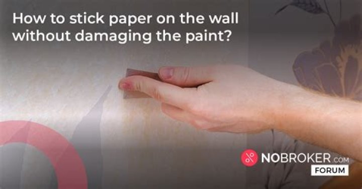 How do you stick something to the wall without damaging it?