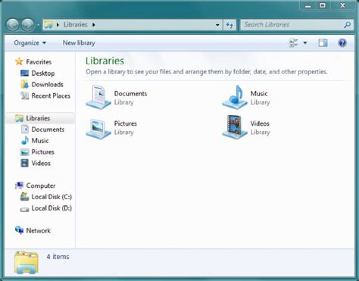 What are the default libraries in Windows 7?