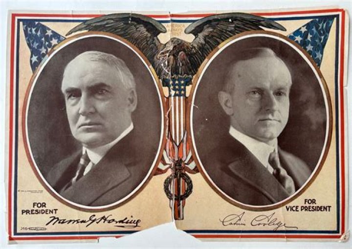 What were the economic policies of President Harding and Coolidge?